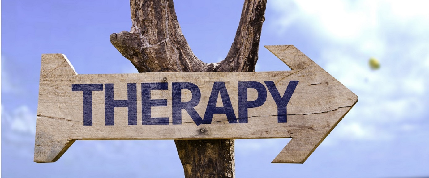 Wooden-sign-with-the-word-therapy-painted-on-in-blue-letters-Does-therapy-work-iMind-Mental-Health-Solutions
