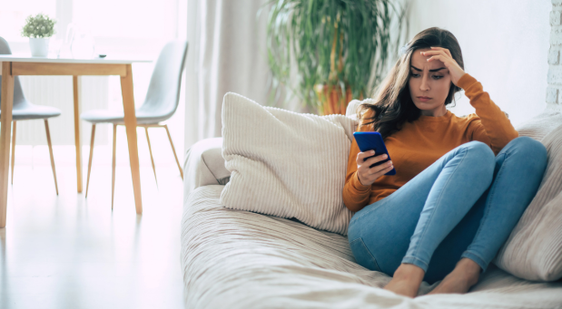 woman-looking-at-phone-why-is-everybody-depressed-iMind-Mental-Health-Solutions