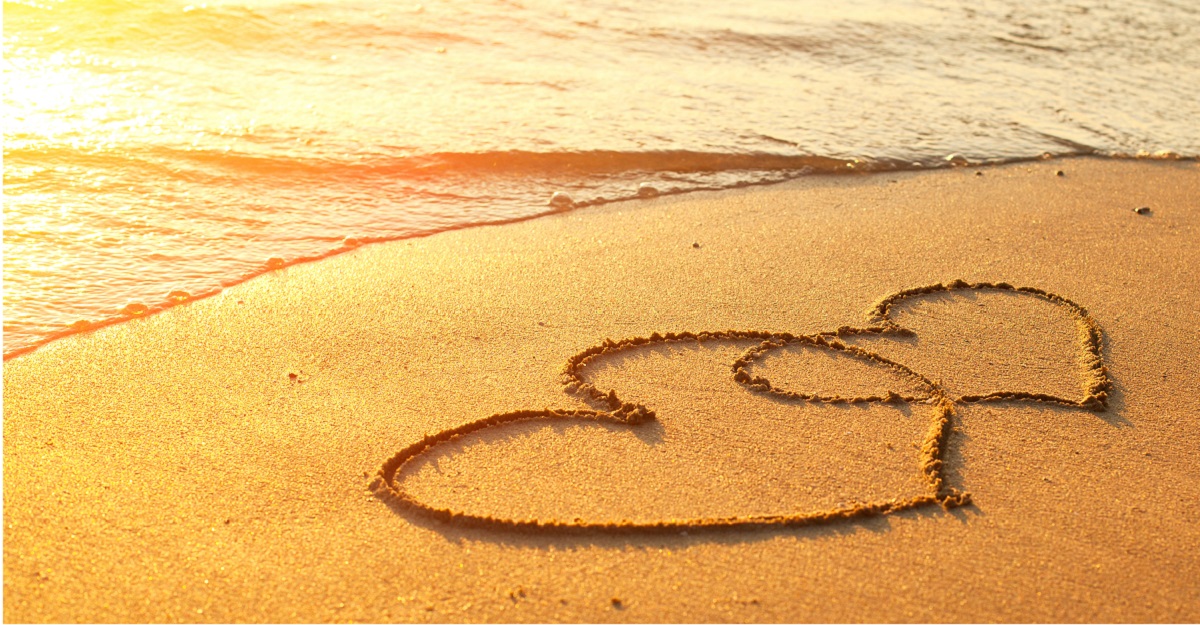 Two-hearts-drawn-on-the-beach-your-brain-on-love-psychology-of-love-iMind-Mental-Health-Solutions