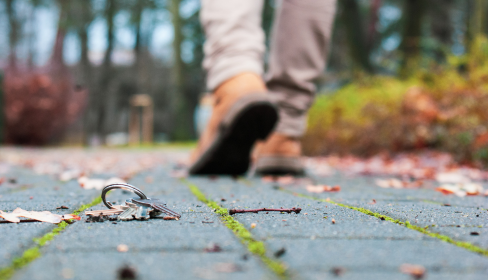 feet-on-a-road-dotted-with-fall-leaves-while-the-person-walks-away-passive-aggressive-port-st-lucie-stuart-fl-iMind-Mental-Health-Solutions