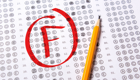 standardized-test-with-a-red-letter-F-circled-in-middle-and-a-number-two-pencil-to-the-side-of-it-how-divorce-affects-the-children-iMind-Mental-Health-Solutions